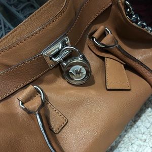 Michael Kors tan purse and wallet